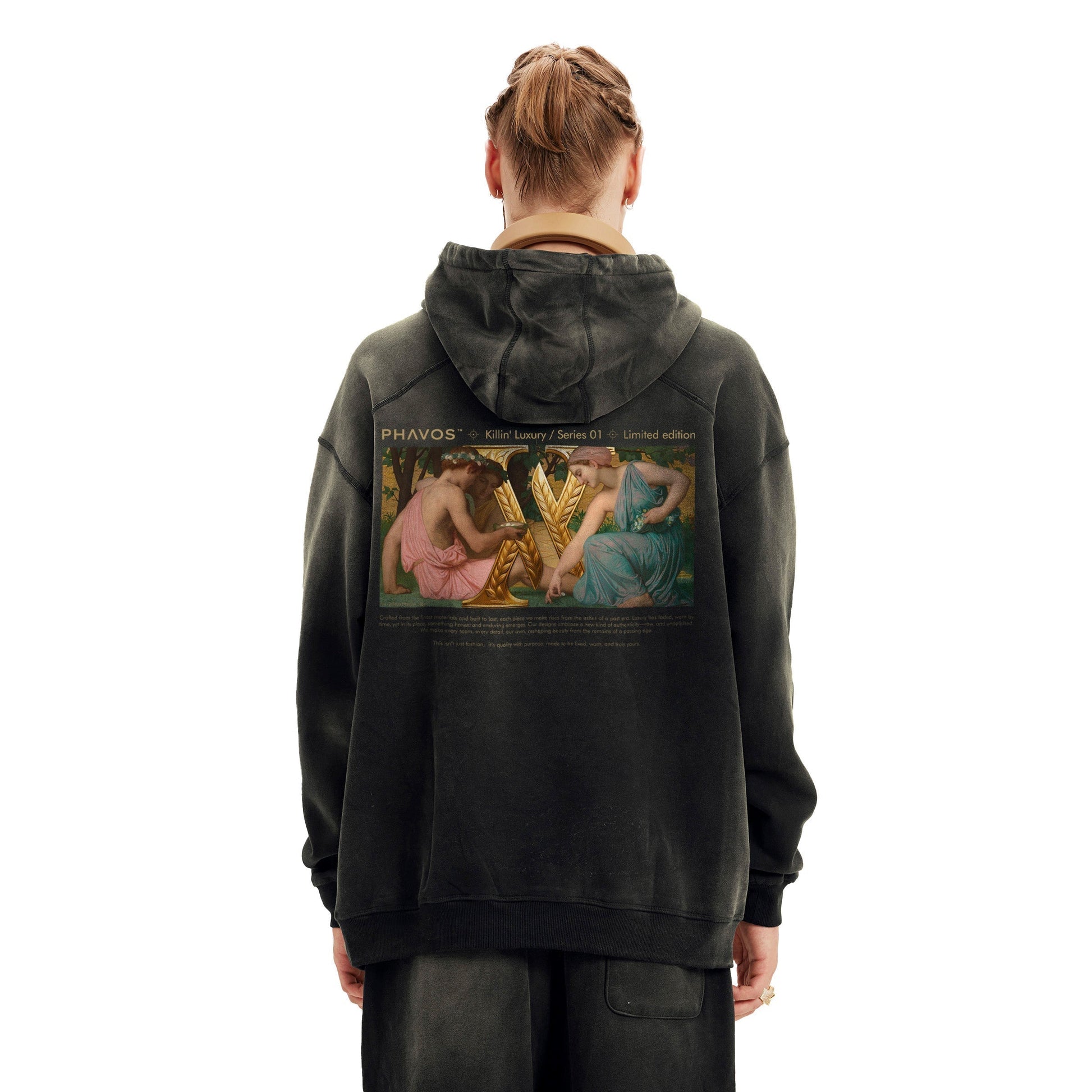 Back view of the luxury streetwear hoodie featuring faded cotton and clean structure.