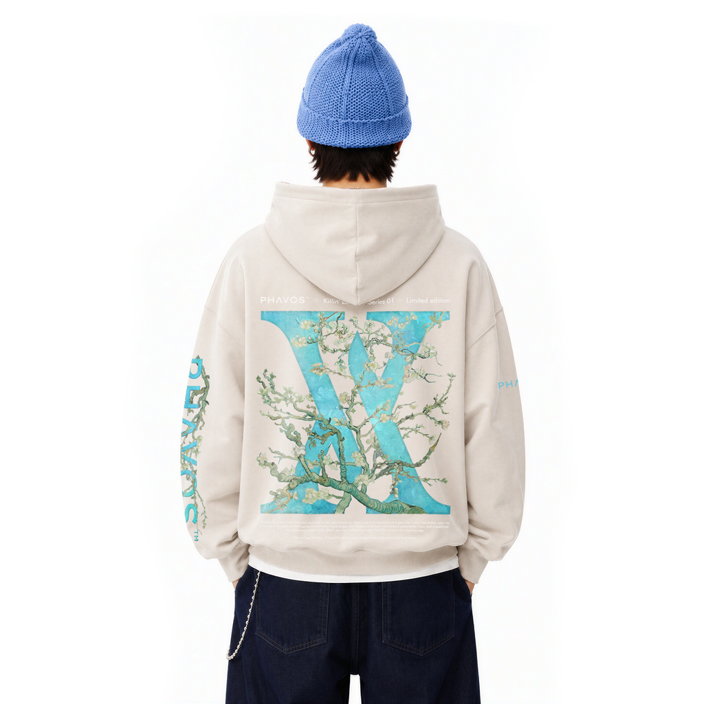 Model wearing Almond Bloom hoodie — back view